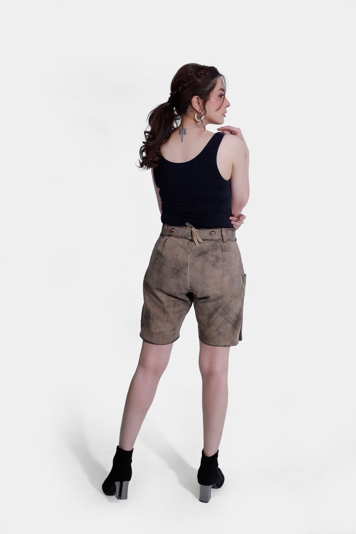 Rear view of Amy Adams Lederhosen highlighting the adjustable waistband and the back design of the knee-length shorts.