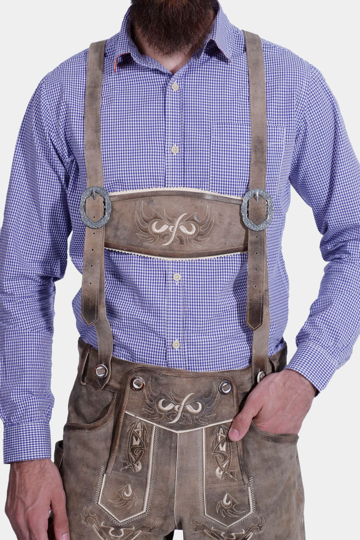 man wearing traditional lederhosen suspenders
hosenträger für lederhosen​