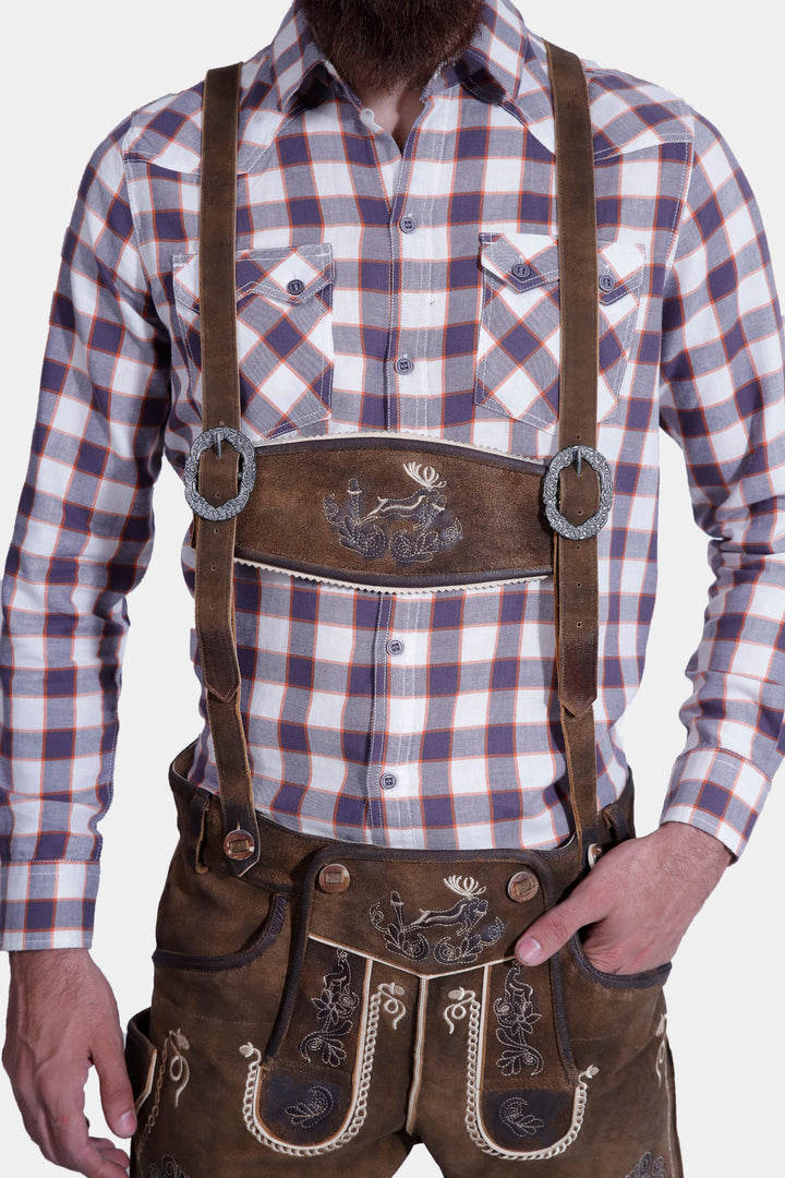 man wearing traditional lederhosen suspenders
hosenträger für männer​