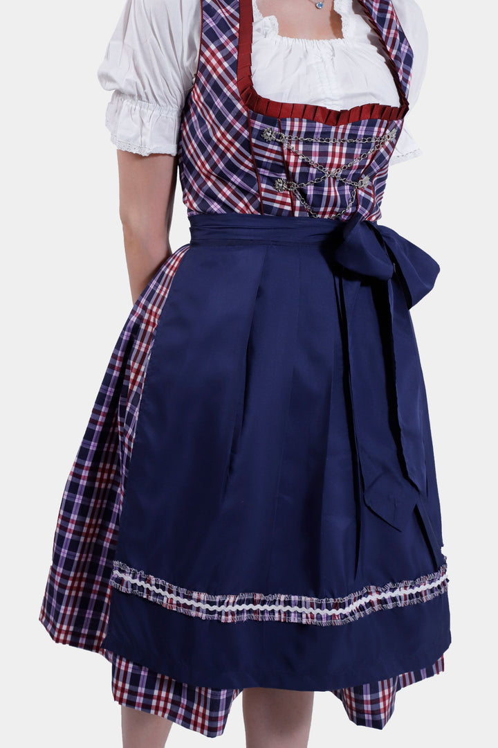 Rear view of the Dirndl Hilker, focusing on the detailed back of the bodice and the neatly tied apron at the waist.