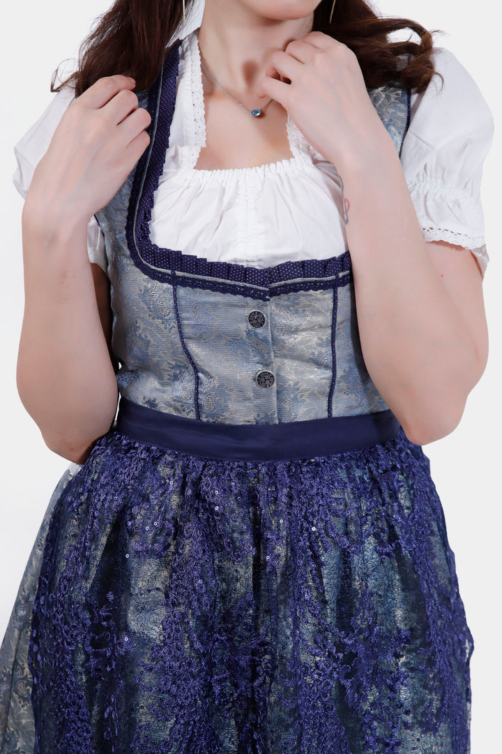 Close-up of the Dirndl Maria Lara bodice, highlighting the detailed lace work and elegant polyester buttons.