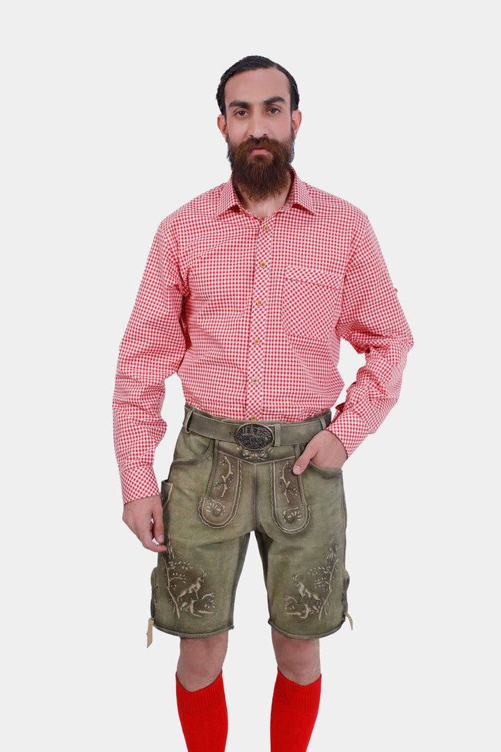 A man wearing the Heidelberg Lederhosen in Meadow Green, paired with a red checkered shirt, showcasing the front view.