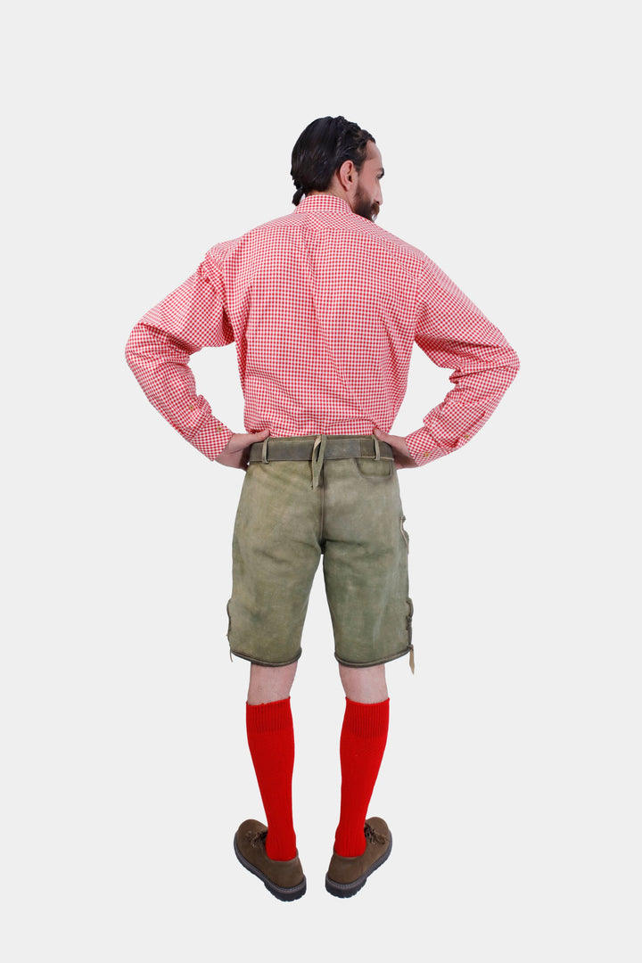 Rear view of the man wearing the Heidelberg Lederhosen, showcasing the adjustable waistband and back pocket.