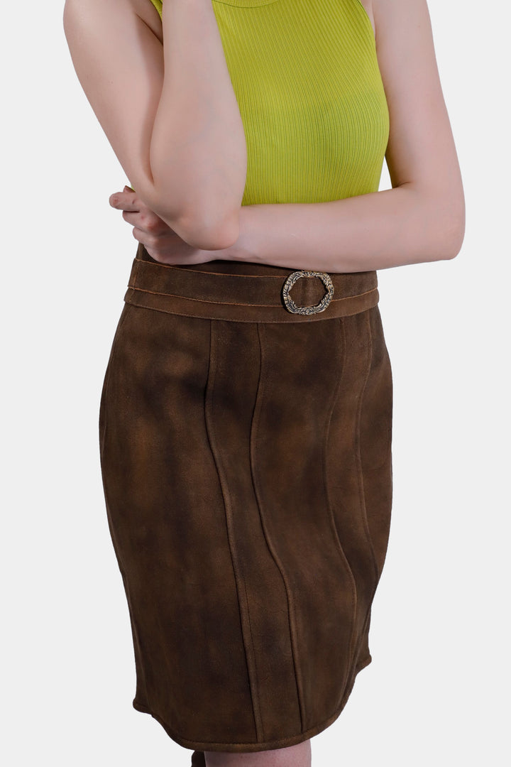 Side view of the Leni Lederhosen Skirt in Rustic Oak, showcasing the knee-length design and smooth texture of the goat suede leather.