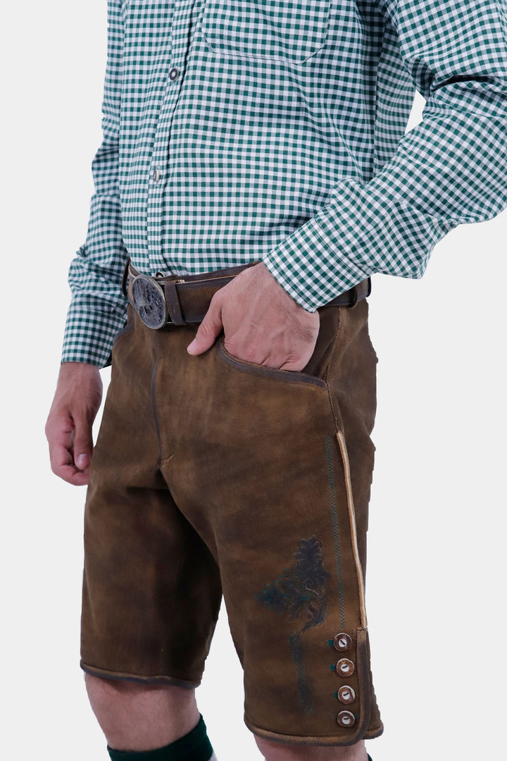 Close-up view of the Mahler Lederhosen, showing the detailed embroidery on the side and the buttons along the knee area.