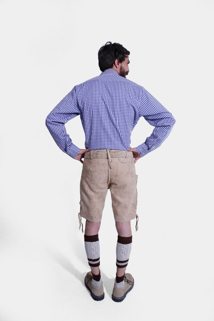 Rear view of the Mookie Lederhosen Outfit, displaying the tan leather lederhosen and blue and white checkered shirt from behind.