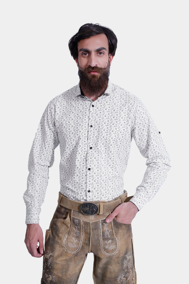 Front view of a man wearing Mozart Lederhosen with a white patterned shirt, emphasizing the intricate embroidery and craftsmanship of the traditional Bavarian leather shorts.