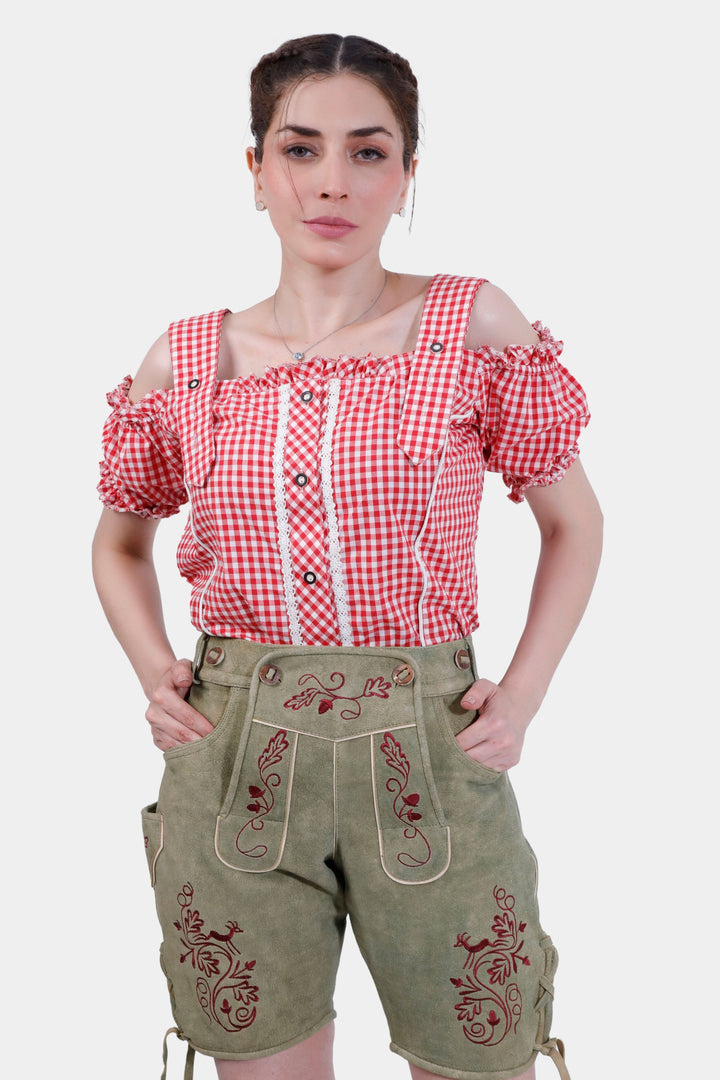 Showcase video of the Olivia Charm Lederhosen, highlighting the product's detailed craftsmanship, rich suede texture, and stylish embroidery through various model poses and close-up shots.