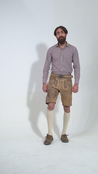 Man showcasing Boris Becker Lederhosen, rotating to display all angles of the outfit, including front, side, and back views.