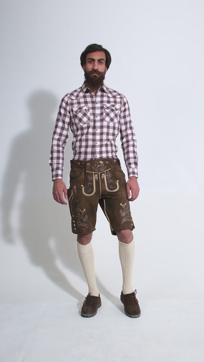 Man showcasing Chestnut Oak Lederhosen, rotating to display all angles of the outfit, including front, side, and back views.